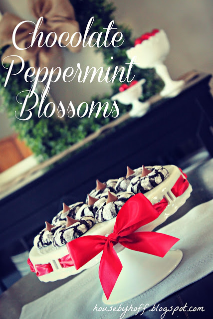 Chocolate peppermint blossoms poster, with the cookies on a cake stand and a red ribbon around it.