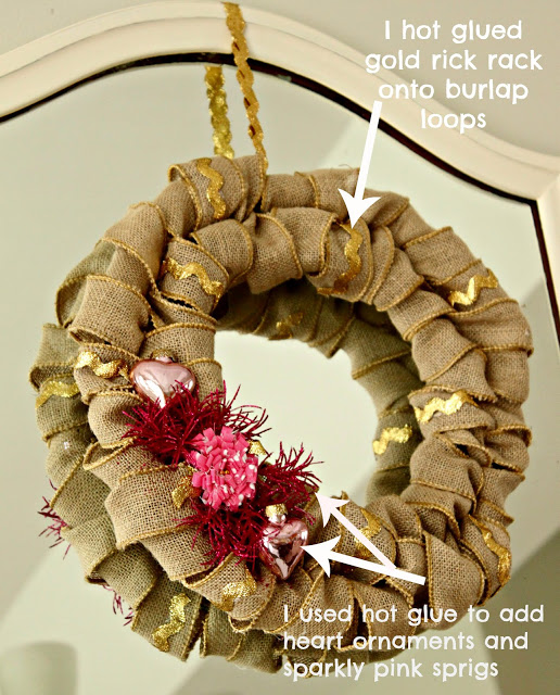 Arrows pointing to the sparkle and bling on the burlap wreath.