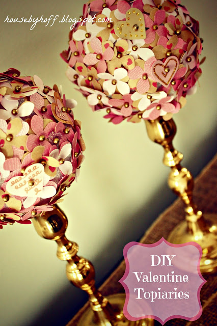 Two heart and flower Valentine topiaries on the table.