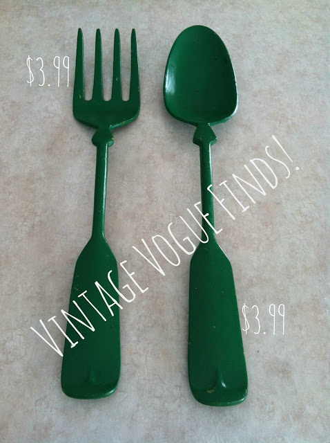 A green fork and spoon.