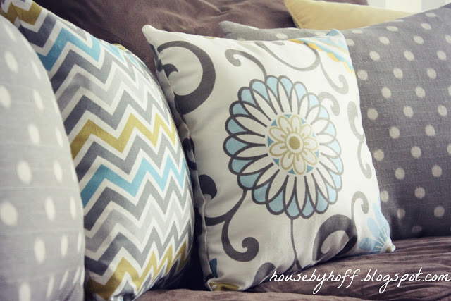 Floral, polka dot and zig zag patterned throw pillows.