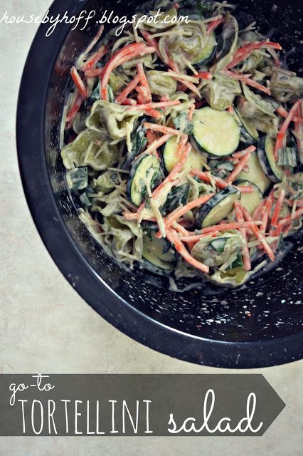 Totellini salad in a black bowl.