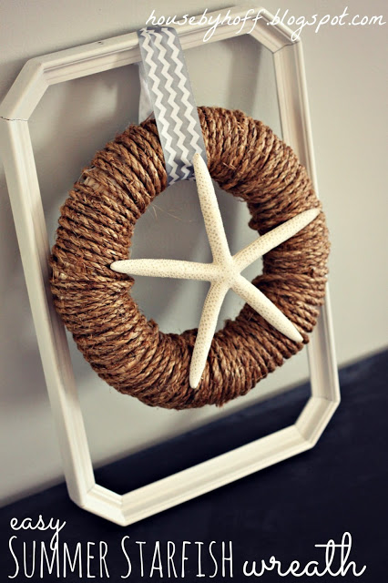 Starfish seashell wreath on a frame.