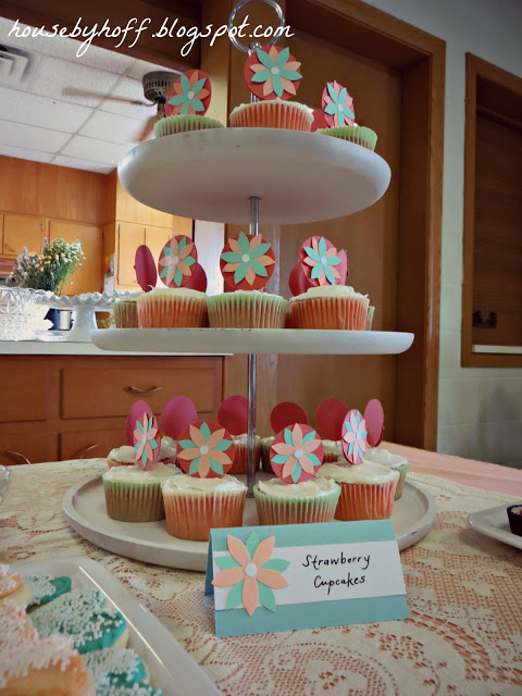 Decorated cupcakes on a stand.