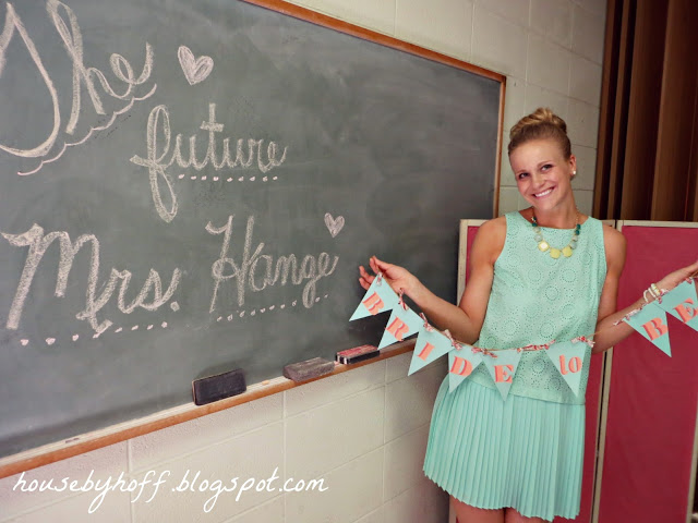 Chalkboard with the future Mrs. written on it.