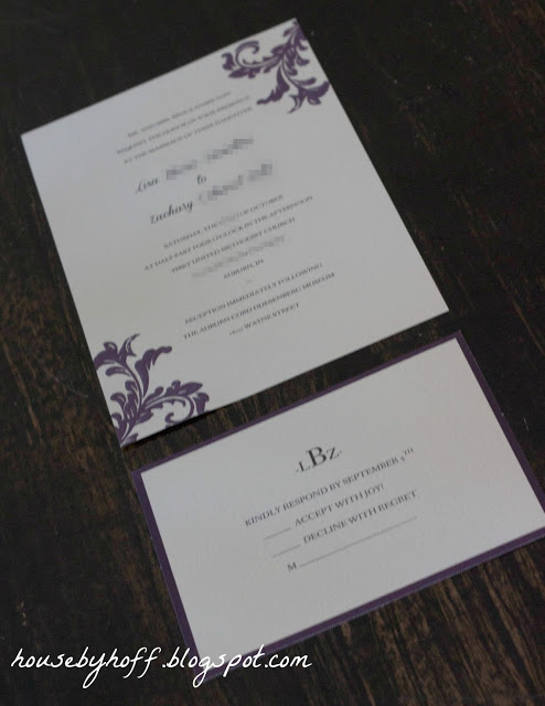 Wedding invite on table.