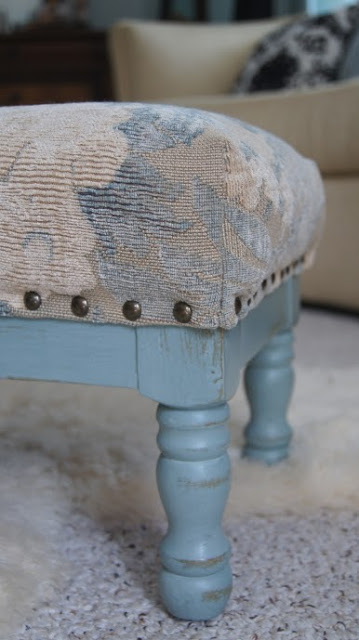 A blue distressed stool.