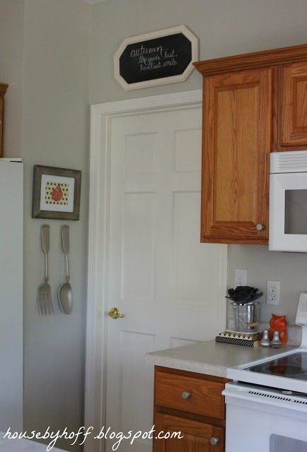 The corner of the kitchen decorated for fall.