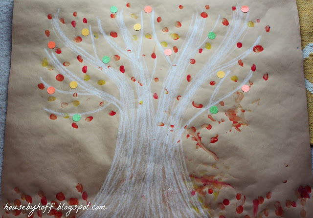 Decorating the painted tree.