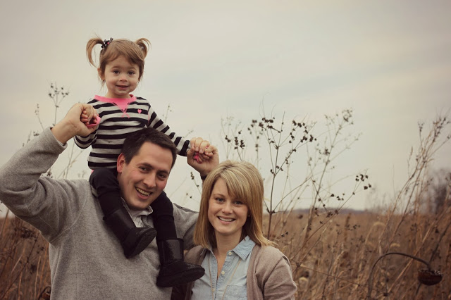 The little girl on Daddy's shoulders in the picture.