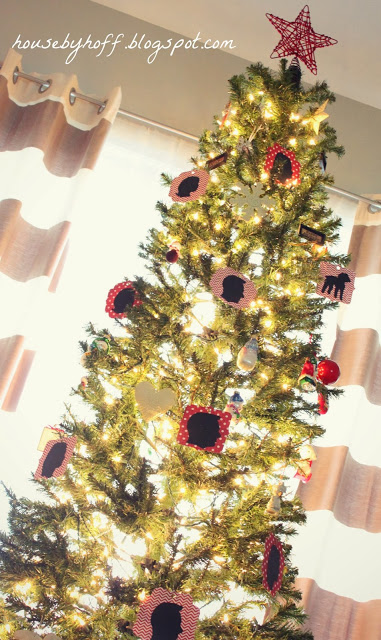 The home made ornaments on the Christmas tree.