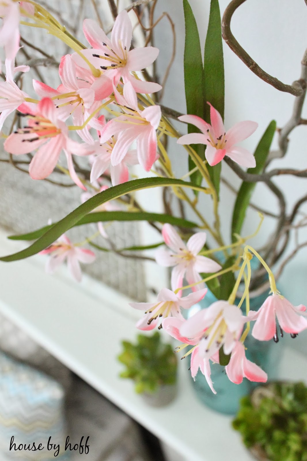 Fake Succulent Pots via housebyhoff.com Fake soft pink flowers.