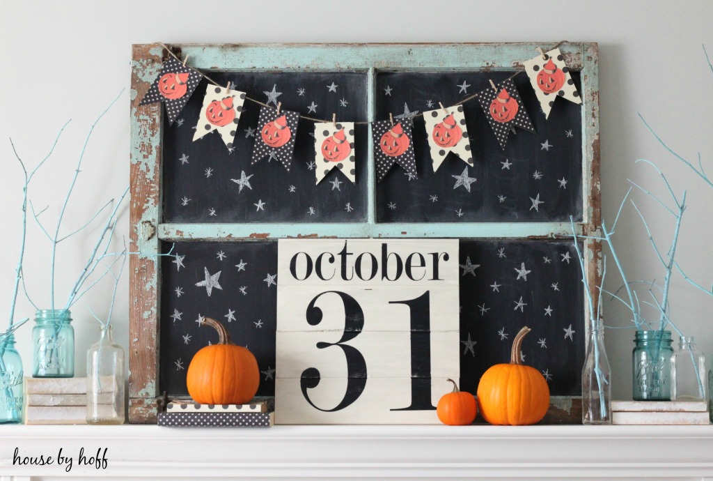 On mantel an October 31st sign.