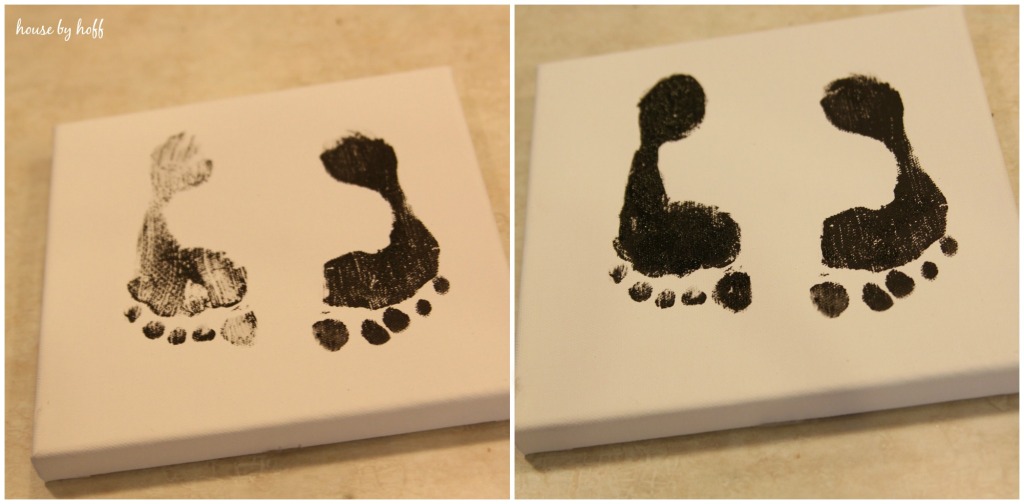 Black footprints on a white canvas.