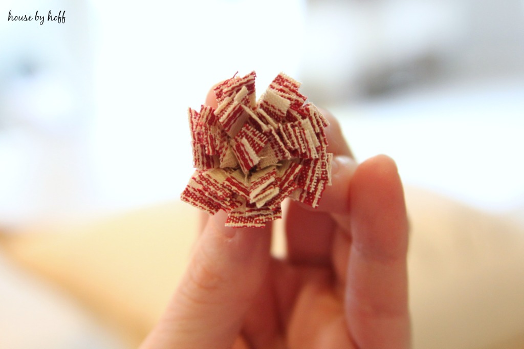 Red and white fabric flower.