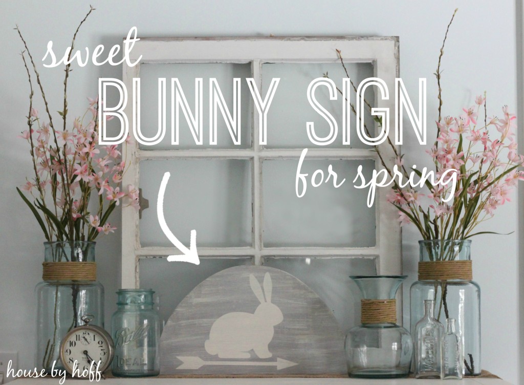 A small half circle bunny and arrow sign.