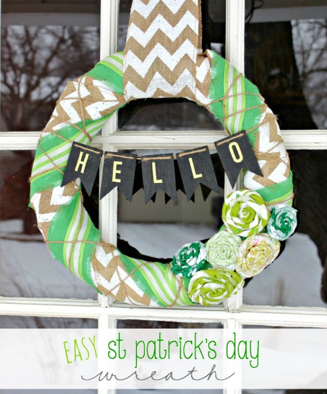 A St. Patrick's inspired wreath hanging in the window.