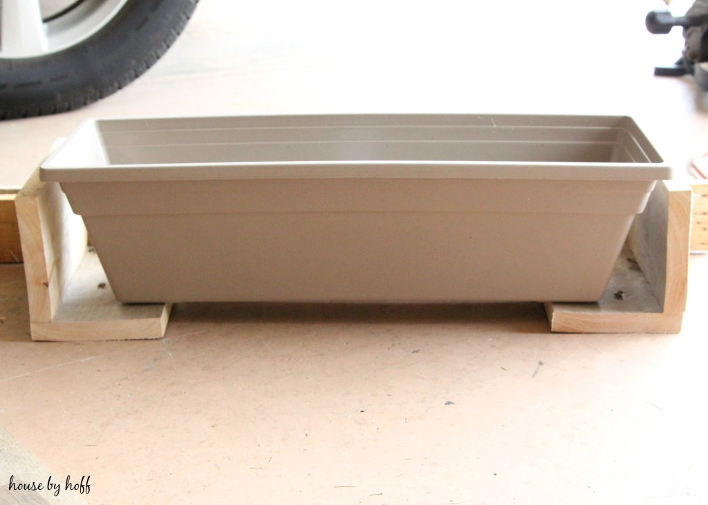 Rectangular plastic planter box.