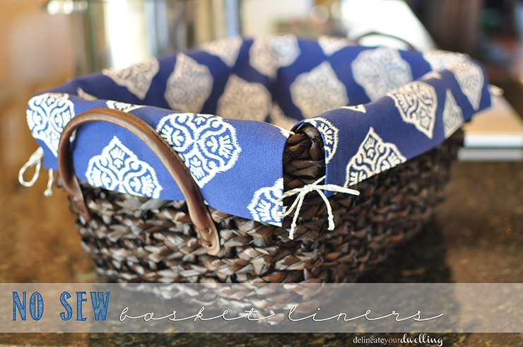 Blue and white fabric lining a wicker basket.