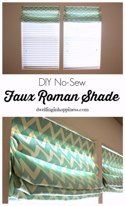 No sew green and white roman shades on window.