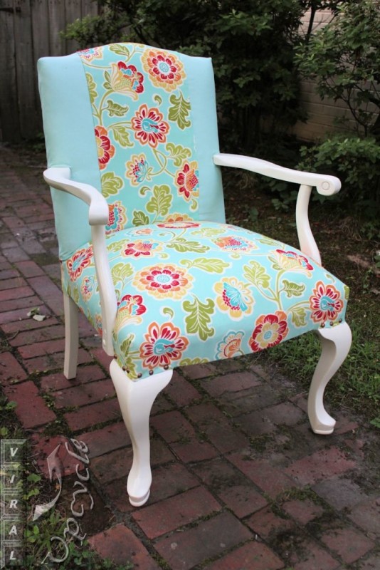 White chair reupholstered with blue floral.