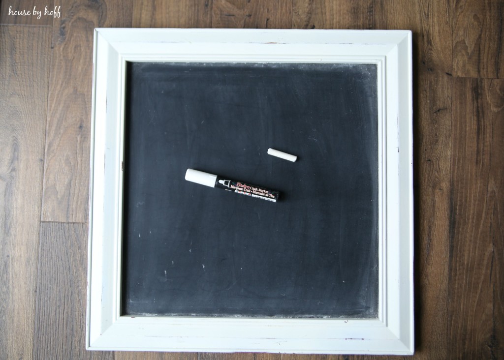 Chalkboard with chalk and a bistro marker.
