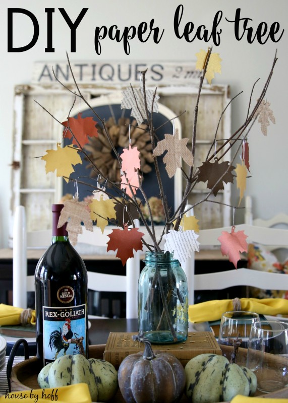 The DIY paper leaf tree in a blue mason jar as a centerpiece.