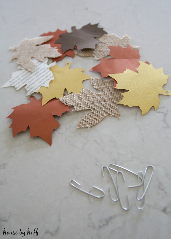 The cut outs of the paper leafs on the counter.