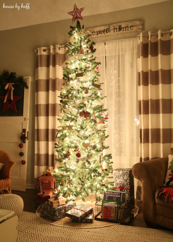 Christmas Home Tour with a large Christmas tree in front of a window.