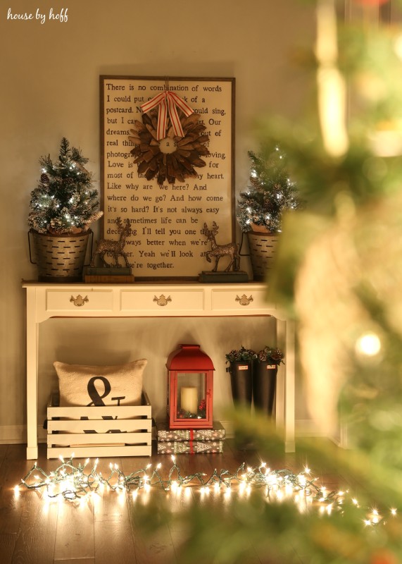 A console table in the hallway decorated for Christmas.