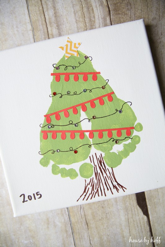 The canvas footprints turned into a Christmas tree and decorated.