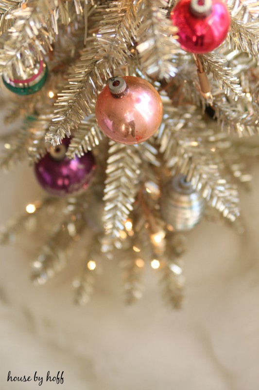 Pink vintage ornament on the Christmas tree.