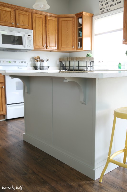 Gray and White Kitchen Island with Quartz Countertops via House by Hoff4