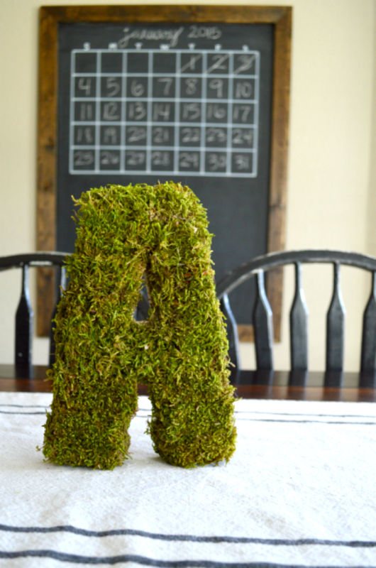 A green moss covered letter A.