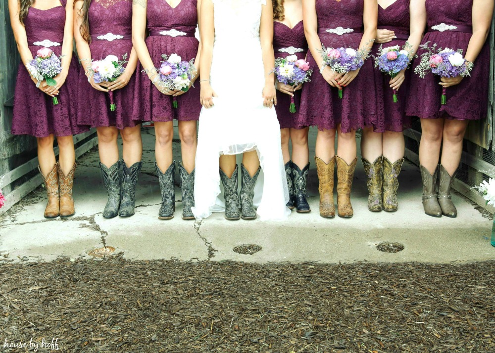 Cowboy boots with bridesmaid dresses and bride.