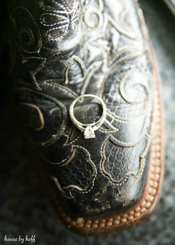 Engagement ring on a cowboy boot.