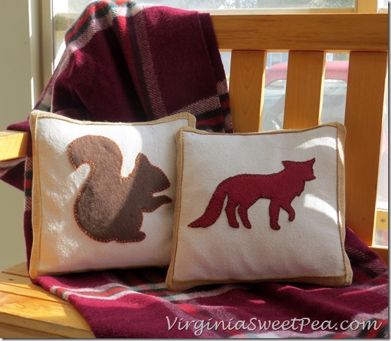 squirrel-and-fox-pillows-on-porch_thumb