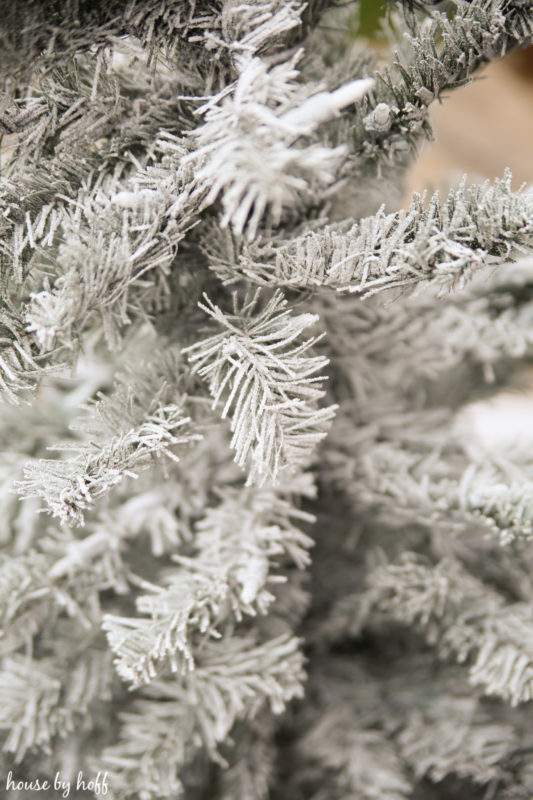 Up close picture of the flocked Christmas tree.