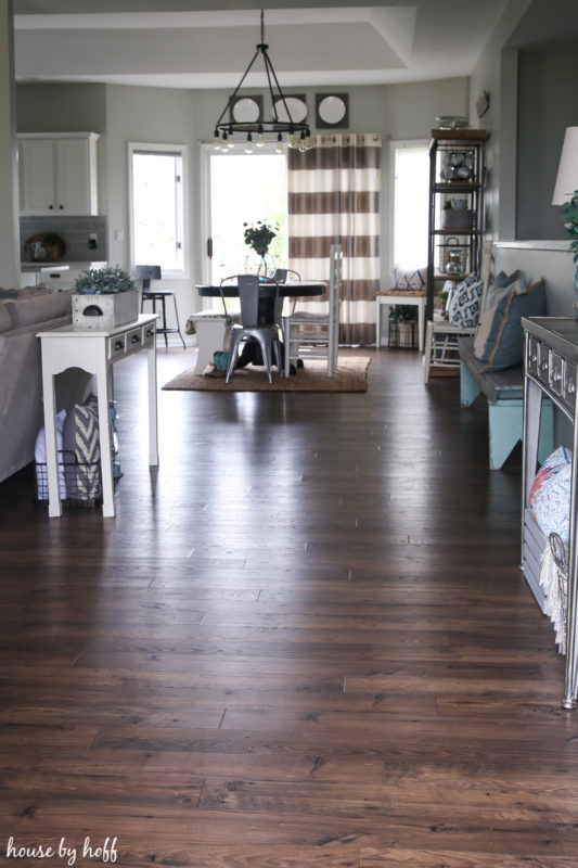 A brown and white striped curtain in the dining room.