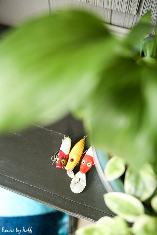 Little fishing hooks on the outdoor bench.