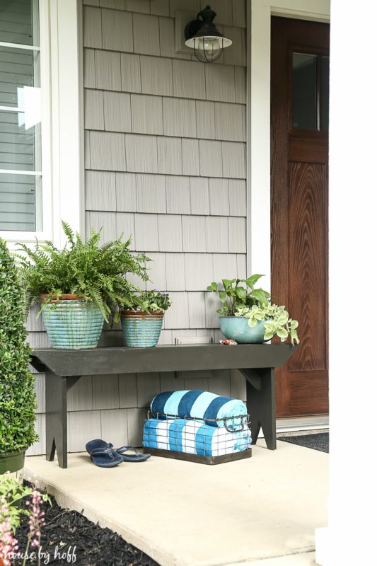 The finished bench outside by the front door.