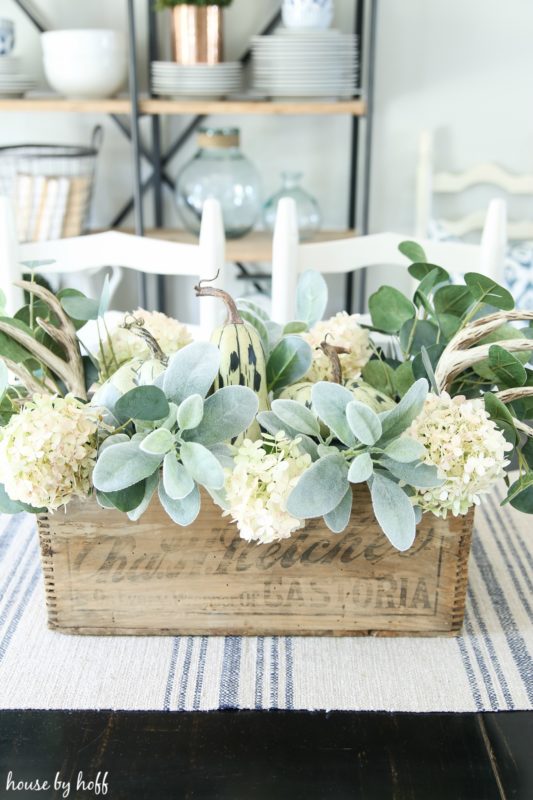 Adding the antlers to the wooden box centerpiece.