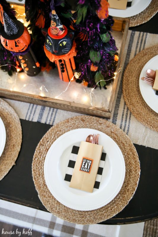 Halloween trees in the middle of table.