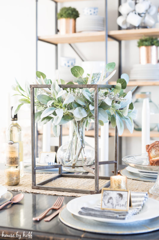 Green centerpiece in the middle of the table.