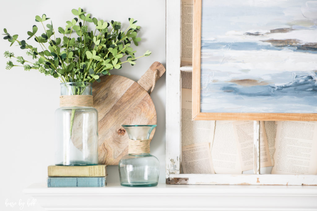 A soft picture of the ocean in the window frame.