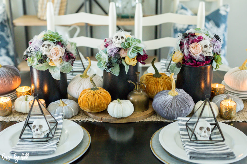 Plates with napkins and skulls on them.