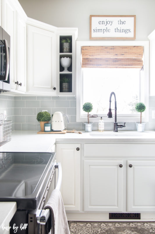 Enjoy the simple things graphic above the sink.