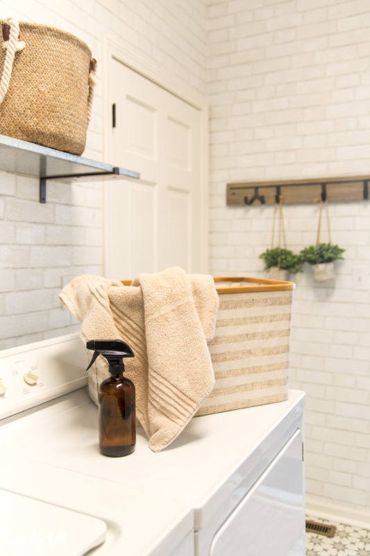 A basket on the washer and dryer.