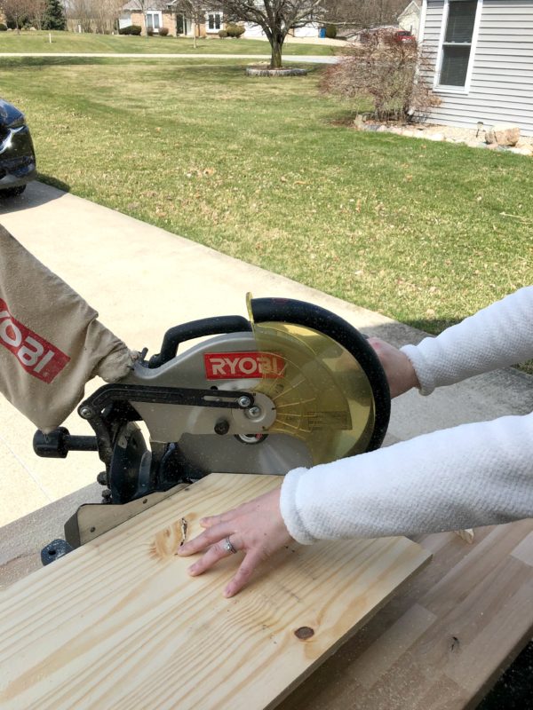Using a power saw to cut out the charcuterie board.