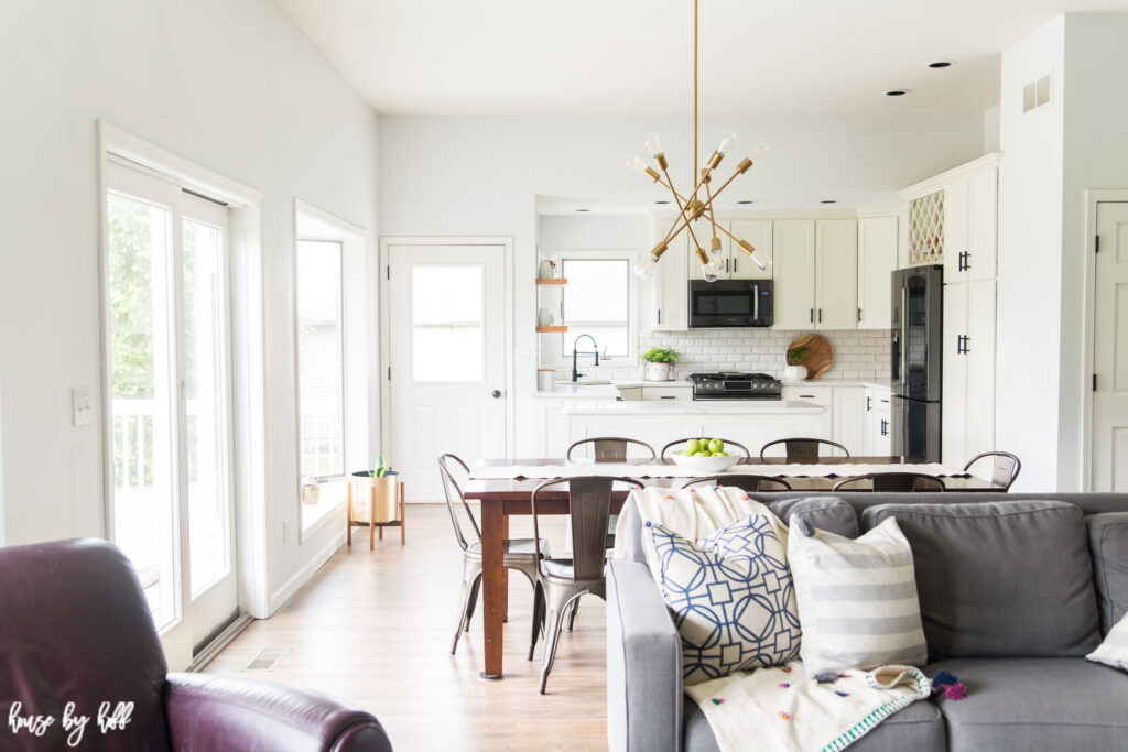 A neutral kitchen and sitting room.